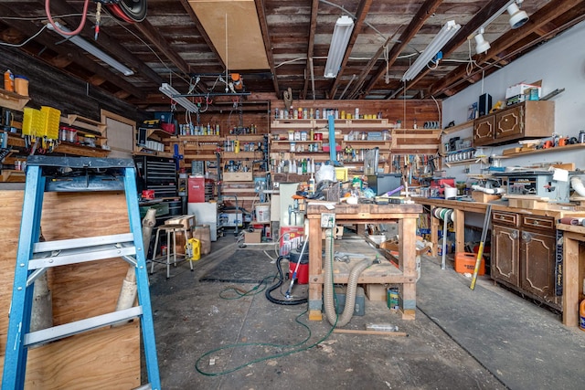 interior space featuring a workshop area