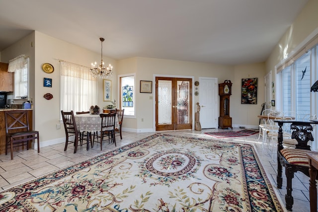 dining room featuring a notable chandelier