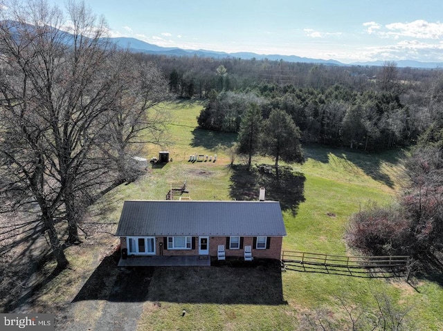 bird's eye view featuring a mountain view and a rural view