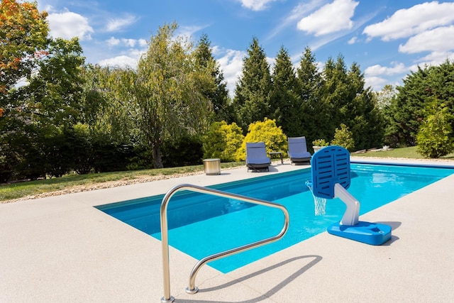 pool featuring a patio area