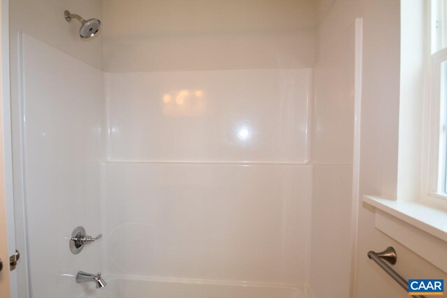 bathroom featuring shower / washtub combination