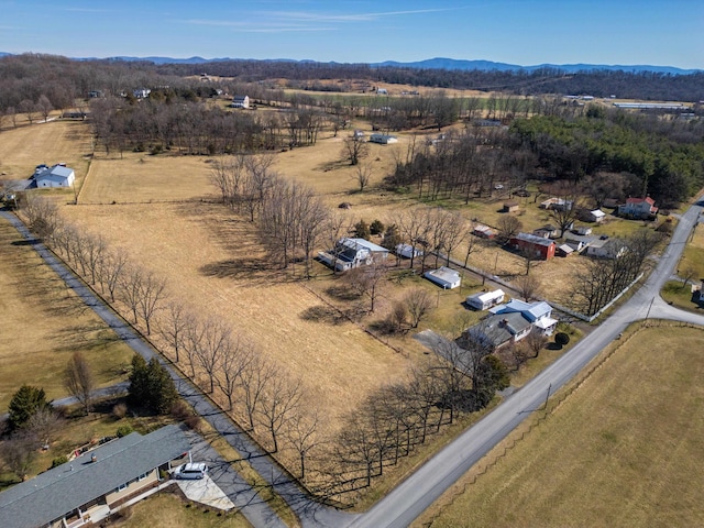 bird's eye view with a rural view and a mountain view