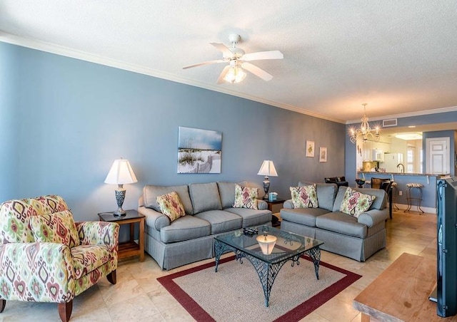 living room featuring tile flooring, crown molding, ceiling fan with notable chandelier, and a textured ceiling