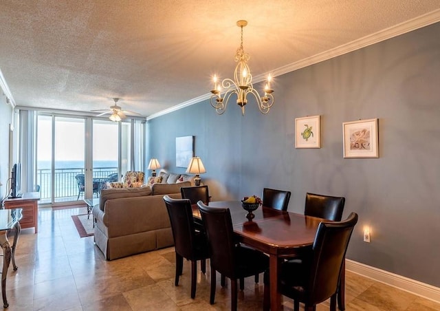 dining space with ornamental molding, tile flooring, and expansive windows