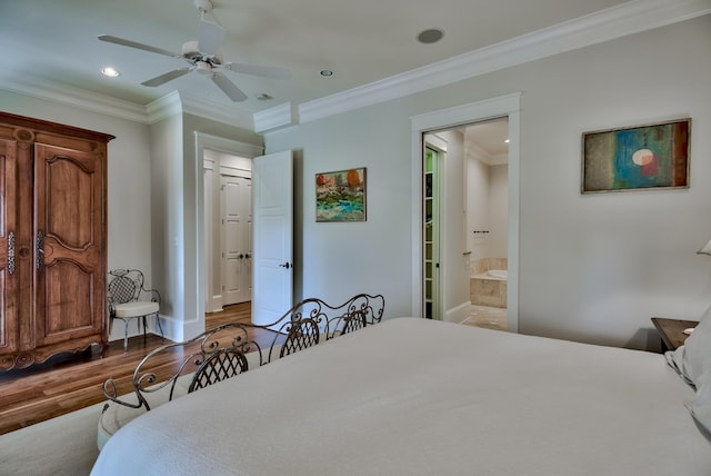 bedroom with dark hardwood / wood-style floors, ceiling fan, crown molding, and connected bathroom