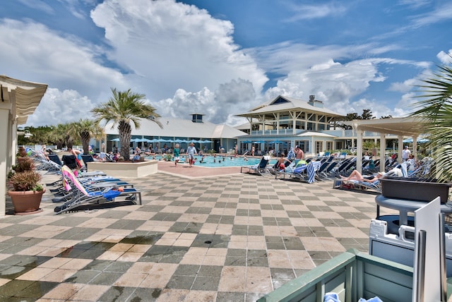 view of swimming pool featuring a patio