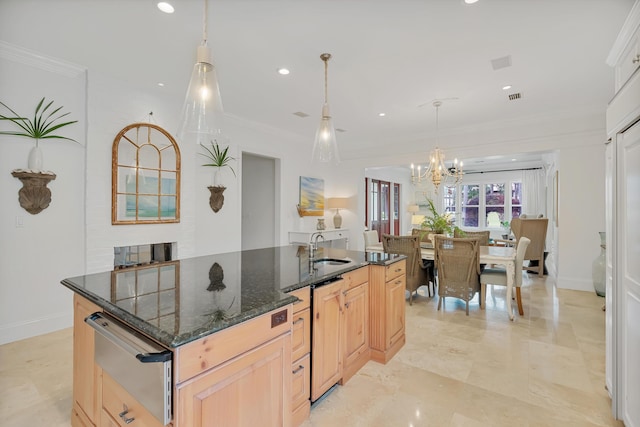 kitchen with a center island with sink, a sink, light brown cabinetry, crown molding, and a warming drawer