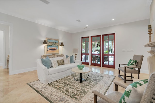 living area with recessed lighting, french doors, and baseboards