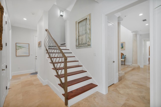 stairway with visible vents, decorative columns, recessed lighting, and baseboards