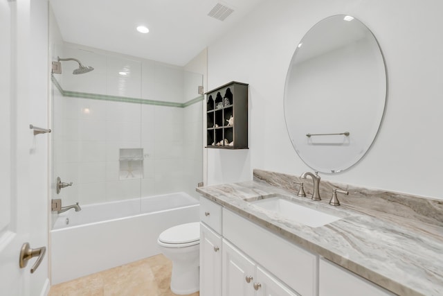 full bathroom with tile patterned floors, visible vents, toilet,  shower combination, and vanity