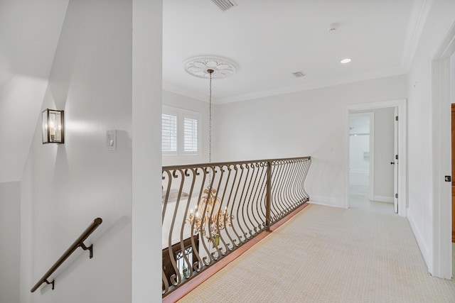 hall featuring baseboards, recessed lighting, ornamental molding, carpet flooring, and an upstairs landing