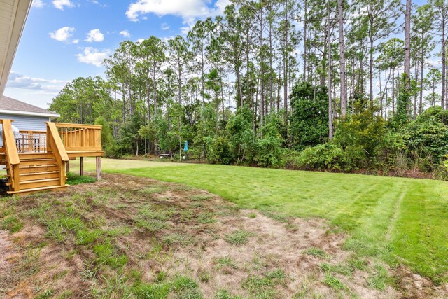 view of yard featuring a deck