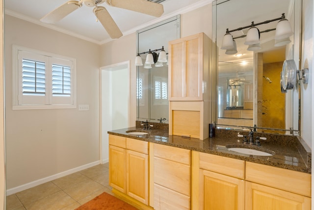 bathroom featuring tile patterned flooring, vanity, ceiling fan, and ornamental molding