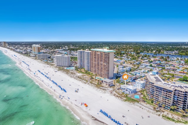 drone / aerial view featuring a view of the beach and a water view