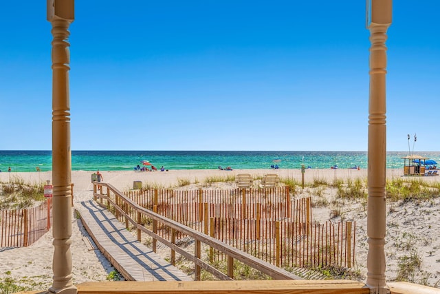 view of water feature with a beach view