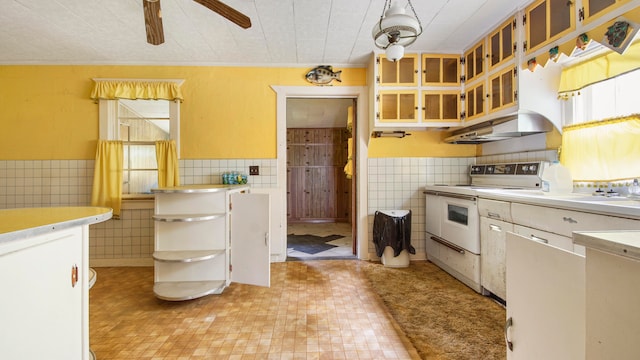 kitchen with tile walls, white electric range oven, ceiling fan, and light tile floors