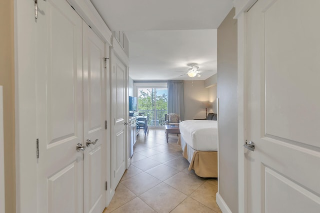 hallway with light tile floors