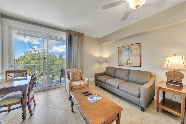 tiled living room with ceiling fan