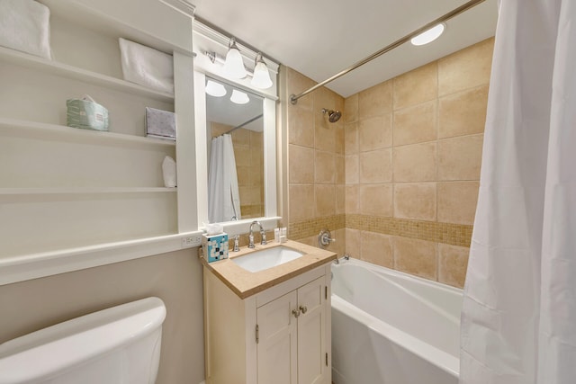 full bathroom with shower / tub combo, vanity, and toilet