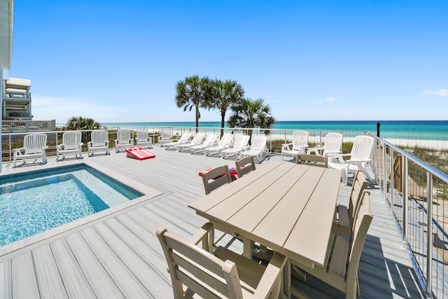 view of pool featuring a water view