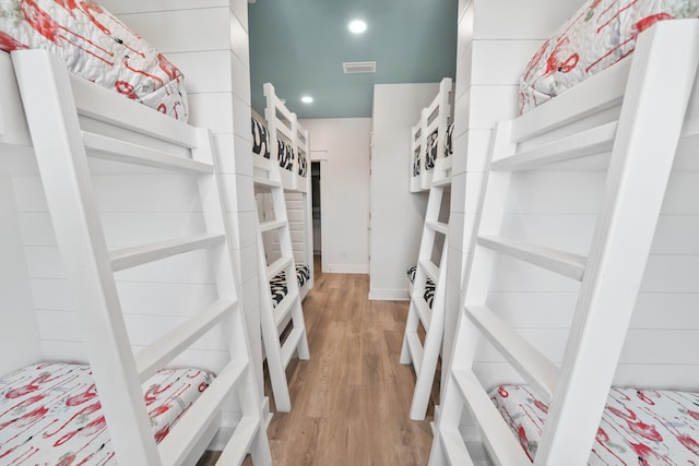 spacious closet featuring hardwood / wood-style flooring