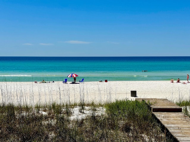 view of water feature with a beach view