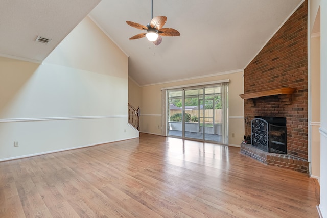 unfurnished living room with light hardwood / wood-style flooring, ceiling fan, high vaulted ceiling, and a fireplace