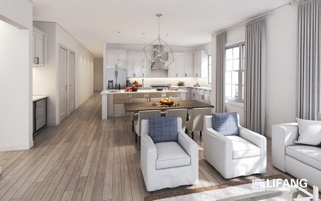 kitchen featuring stainless steel refrigerator with ice dispenser, light wood finished floors, light countertops, open floor plan, and white cabinets