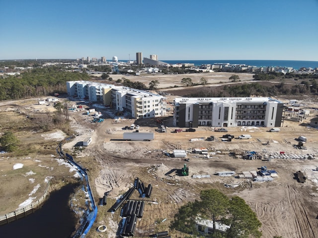 bird's eye view with a water view and a view of city