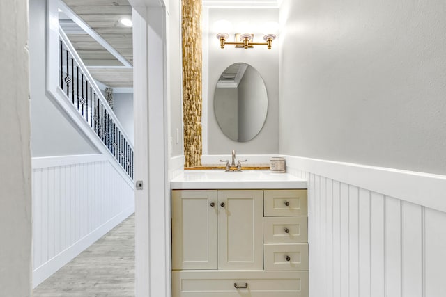 bathroom with wood-type flooring and vanity