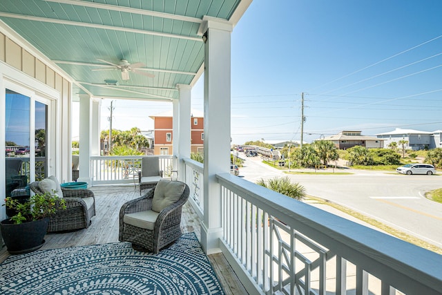 balcony featuring ceiling fan