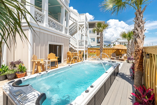 view of pool featuring a wooden deck