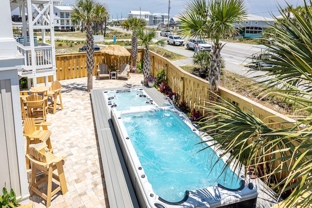 view of pool with a patio area