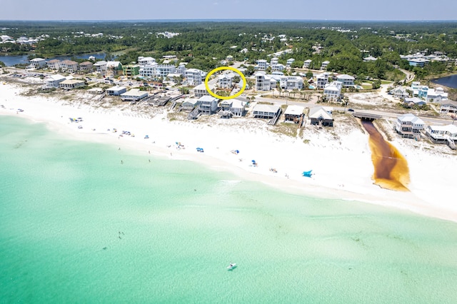 bird's eye view featuring a view of the beach and a water view