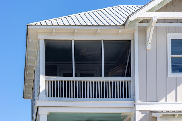 1235 Allen Loop Dr, Santa Rosa Beach, FL 32459 - view of side of home with board and batten siding and a metal roof