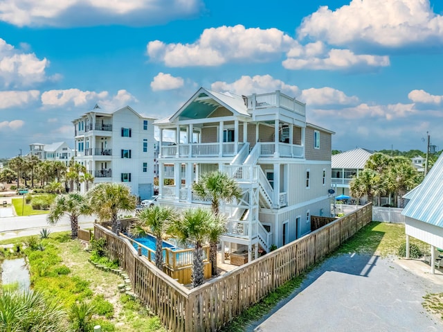 1235 Allen Loop Dr, Santa Rosa Beach, FL 32459 - view of building exterior with a fenced backyard
