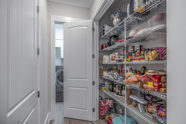 storage area featuring washer / dryer