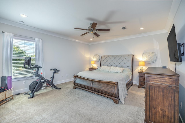 carpeted bedroom featuring baseboards, visible vents, crown molding, and recessed lighting