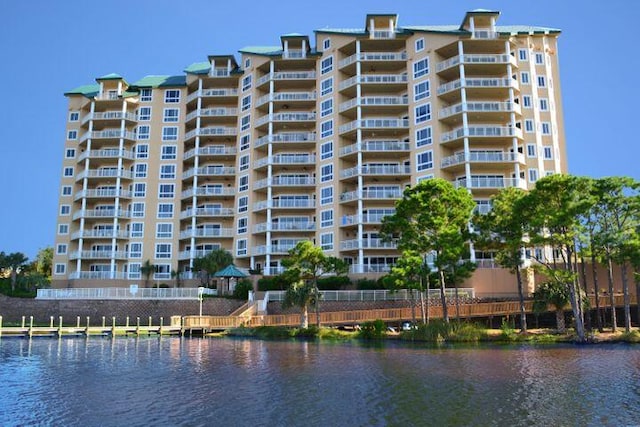 view of building exterior with a water view