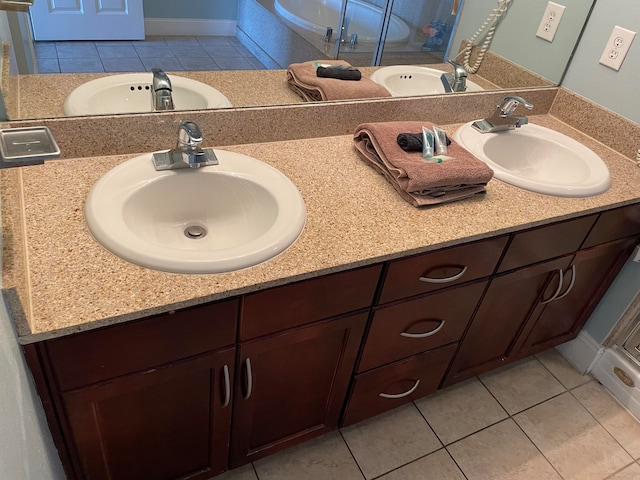 bathroom featuring tile flooring and double sink vanity