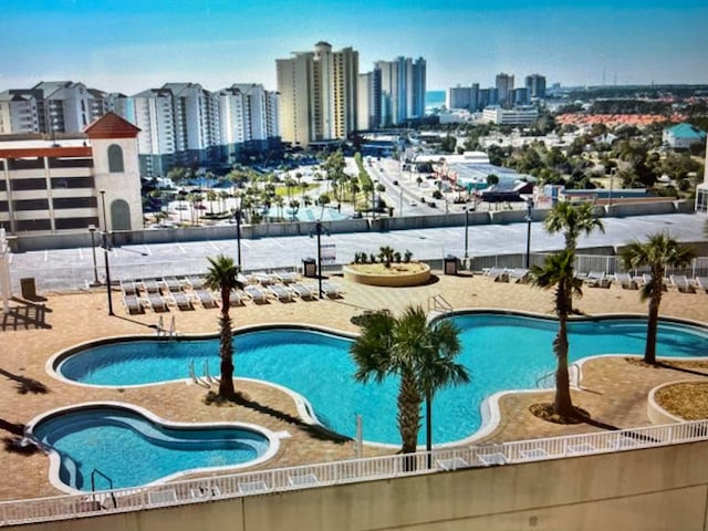 view of pool featuring a patio area