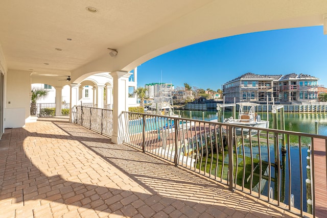 24 Norriego Rd, Destin, FL 32541 - balcony featuring a community pool, ceiling fan, and a water view
