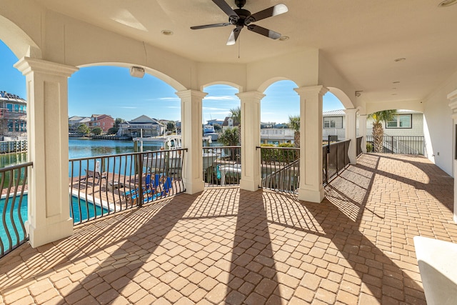 24 Norriego Rd, Destin, FL 32541 - balcony with a water view, ceiling fan, a patio, and a community pool