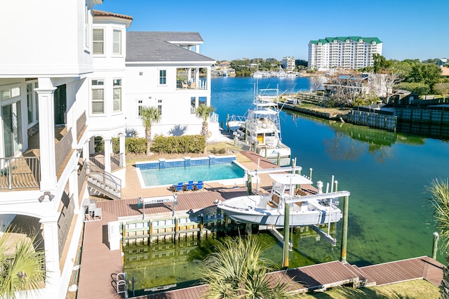 24 Norriego Rd, Destin, FL 32541 - view of swimming pool featuring a dock and a water view