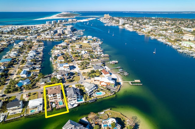 birds eye view of property featuring a water view