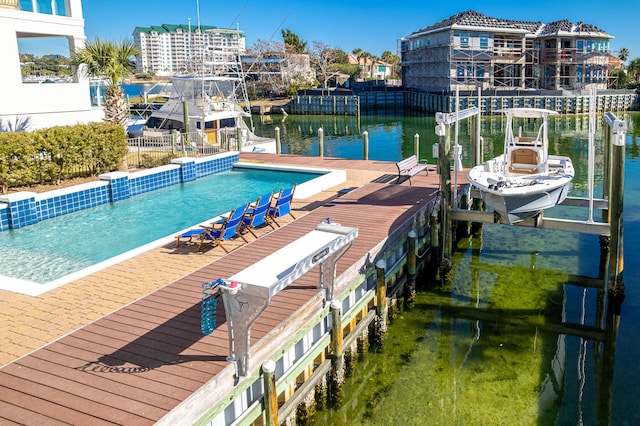24 Norriego Rd, Destin, FL 32541 - view of swimming pool with a boat dock