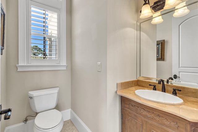 24 Norriego Rd, Destin, FL 32541 - bathroom featuring large vanity, tile floors, and toilet