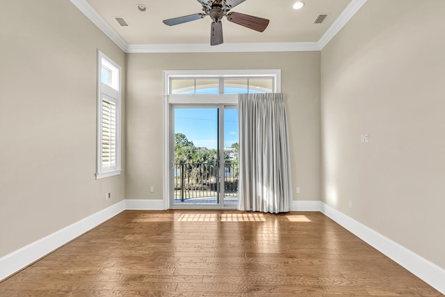 24 Norriego Rd, Destin, FL 32541 - unfurnished room featuring plenty of natural light and dark wood-type flooring