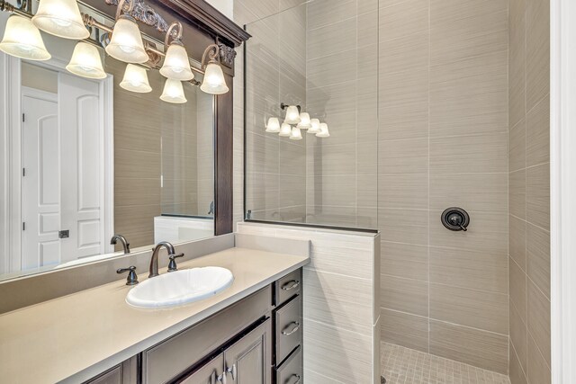 24 Norriego Rd, Destin, FL 32541 - bathroom with vanity with extensive cabinet space and a tile shower