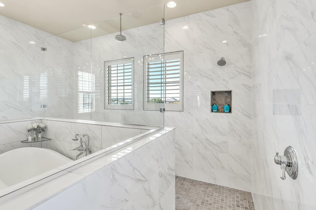 24 Norriego Rd, Destin, FL 32541 - bathroom with tile walls and shower with separate bathtub